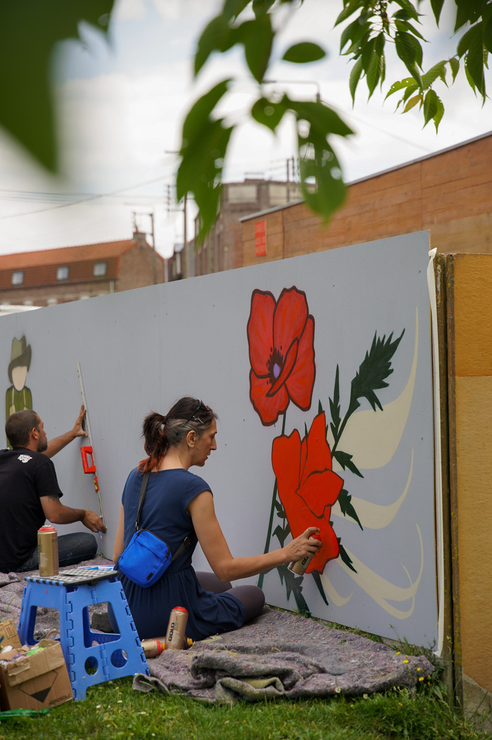 Création d'une fresque murale par le Collectif Renart